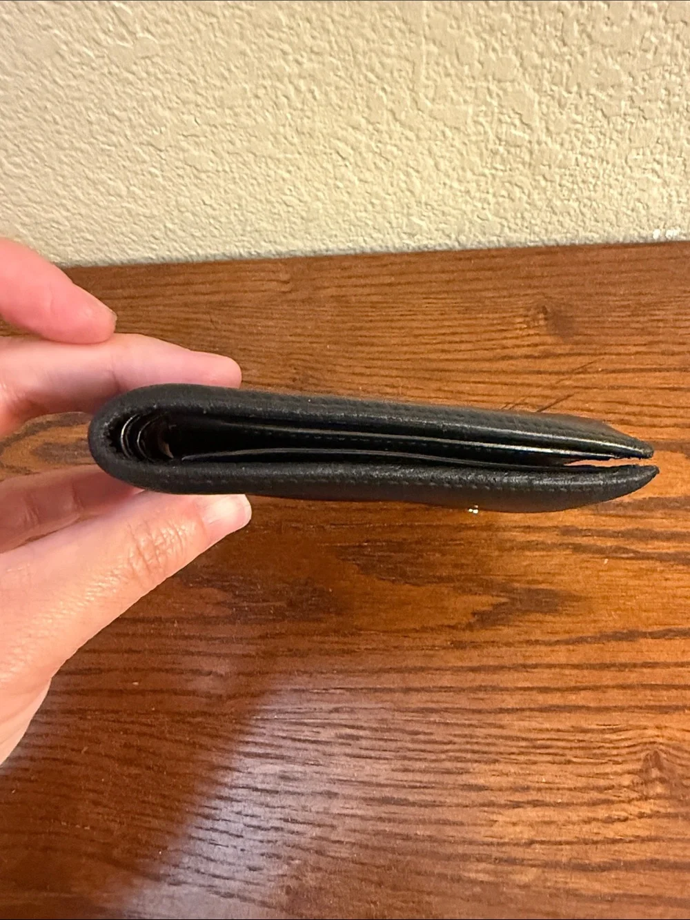 Yves Saint Laurent Black Leather Bifold wallet with Silver YSL Logo-